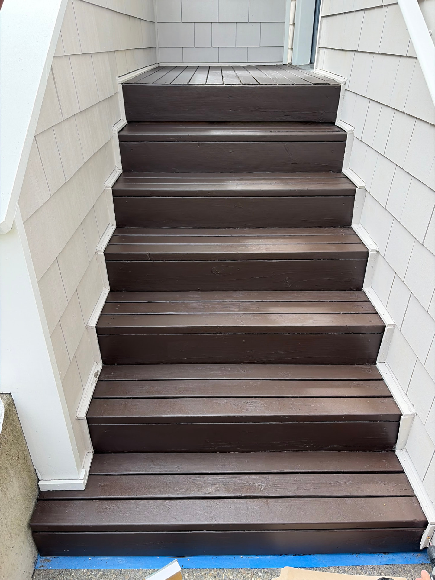 Front entry stairs before and after refinishing — after